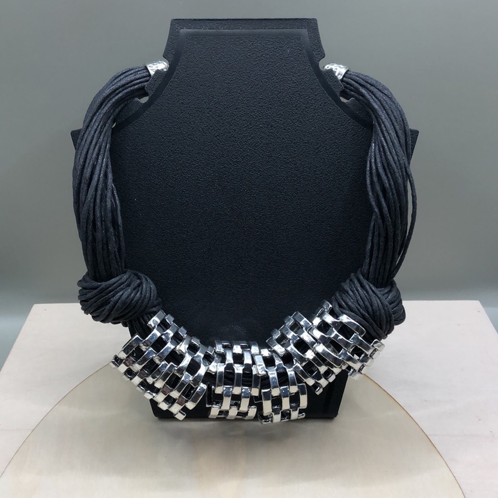 Brutalist modernist style chunky multi cord knot statement necklace.